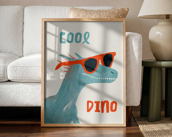 Framed Cool Dino dinosaur print displayed in a playful kids bedroom.