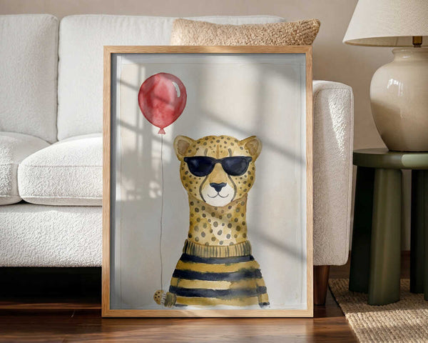 Framed Cool Cheetah Balloon animal nursery print displayed in a playful baby room.