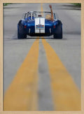 Blue Roadster Waving Drive
