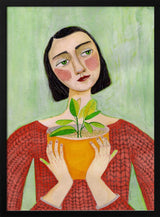 Woman Holding Green Plant