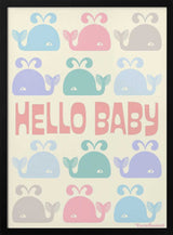 Framed Hello Baby Whales ocean nursery print displayed above a cot.