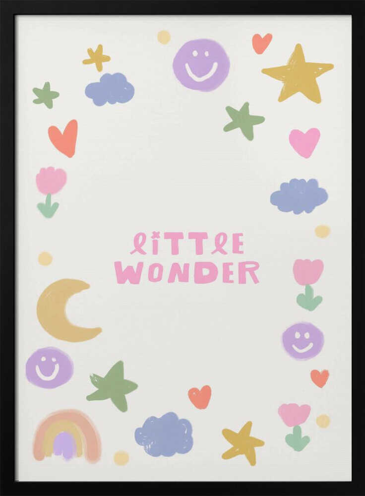 Framed Little Wonder Doodles nursery print displayed beside a cot in a neutral nursery.