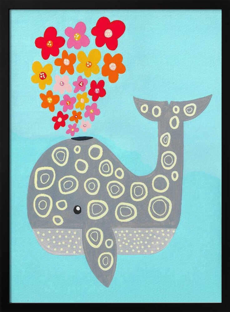 Framed Floral Spouting Whale ocean nursery print displayed in a pastel baby room.