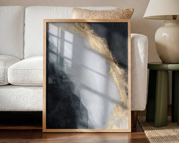 Golden Black Flow abstract wall art print styled in a living room with a natural wood frame
