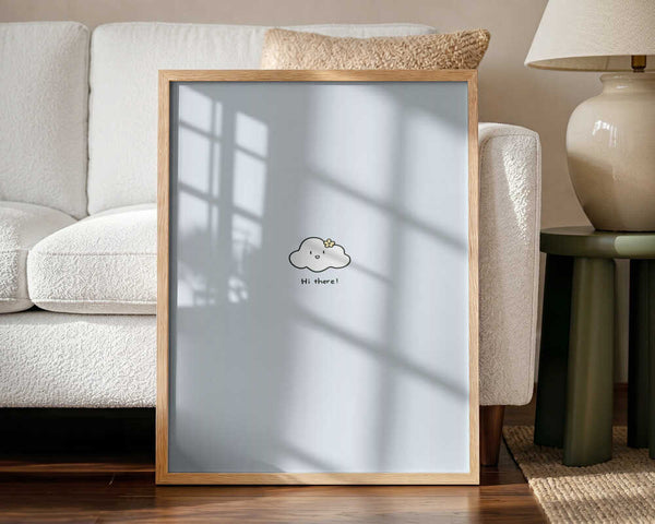 Framed Cute Cloud Hi There nursery print displayed in a soft neutral baby room.