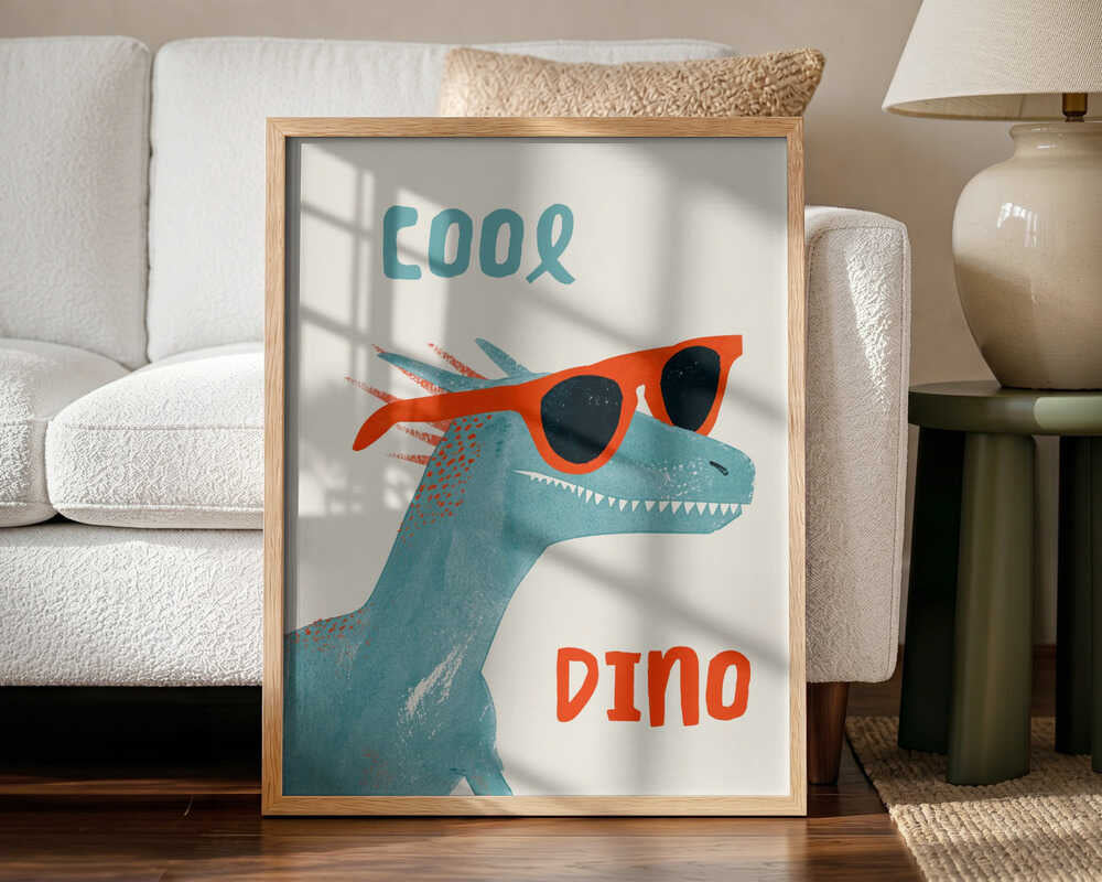 Framed Cool Dino dinosaur print displayed in a playful kids bedroom.