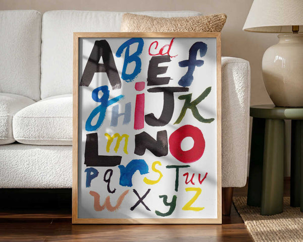Framed Vibrant Painted Alphabet print displayed in a colourful playroom.