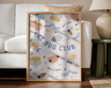 Framed The Bug Club animal nursery print displayed in a bright playroom.