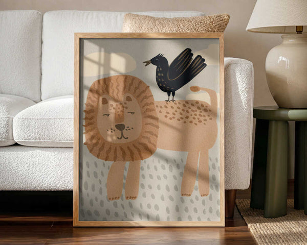 Framed Friendly Lion And Bird safari nursery print displayed in a calm baby room.