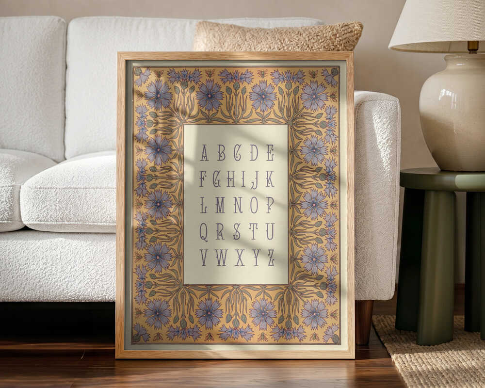 Framed Elegant Botanical Alphabet print displayed in a vintage-style nursery.