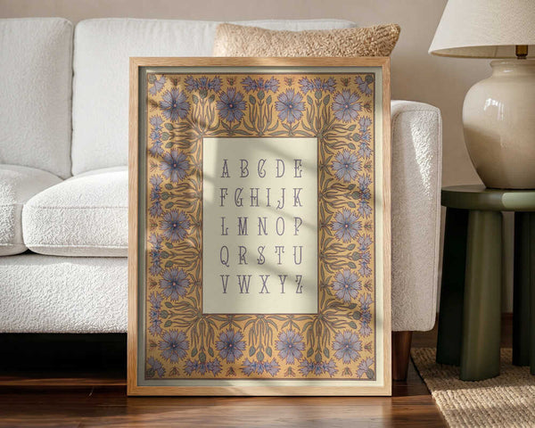 Framed Elegant Botanical Alphabet print displayed in a vintage-style nursery.