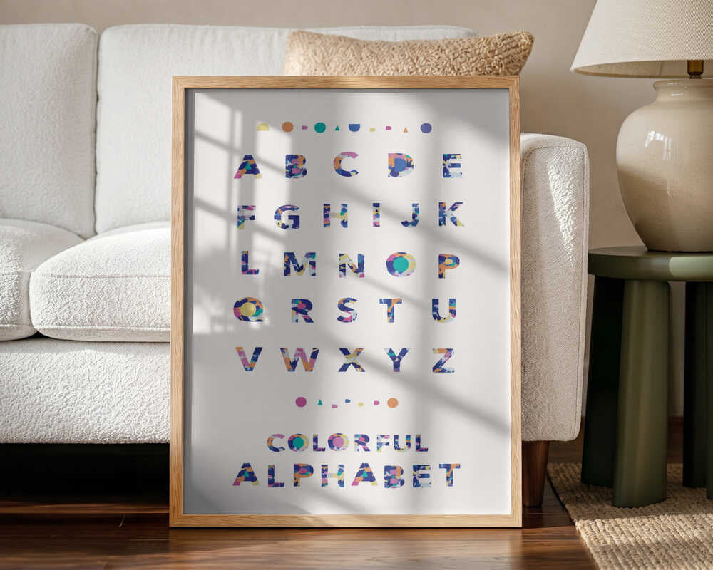 Framed Colorful Abstract Alphabet print displayed in a playroom setting.