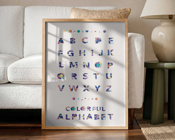Framed Colorful Abstract Alphabet print displayed in a playroom setting.