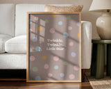 Framed Twinkle Little Star nursery print displayed above a nursing chair.
