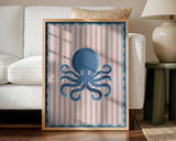 Framed Playful Blue Octopus ocean nursery print displayed in a nautical-themed baby room.