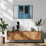 Elderly Woman in Blue Window