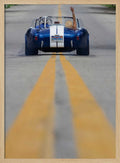 Blue Roadster Waving Drive