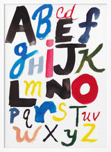 Framed Vibrant Painted Alphabet print displayed in a colourful playroom.