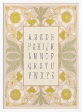 Framed Elegant Floral Alphabet print displayed in a vintage botanical nursery.