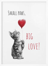 Framed Small Paws Big Love animal nursery print displayed above a nursing chair.
